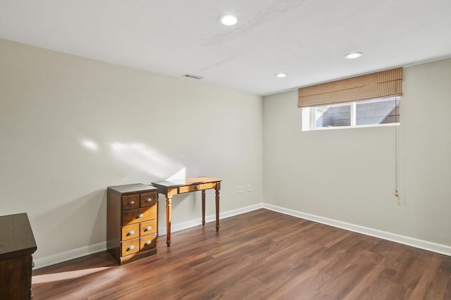 office space featuring dark hardwood / wood-style flooring