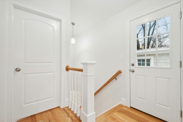 doorway to outside with hardwood / wood-style flooring