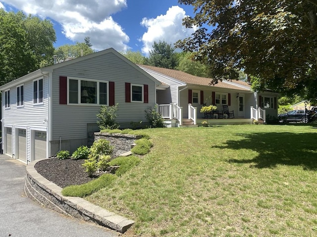 9 Pine City Rd, Carver, MA 02330 - single story home featuring driveway, an attached garage, a porch, and a front lawn