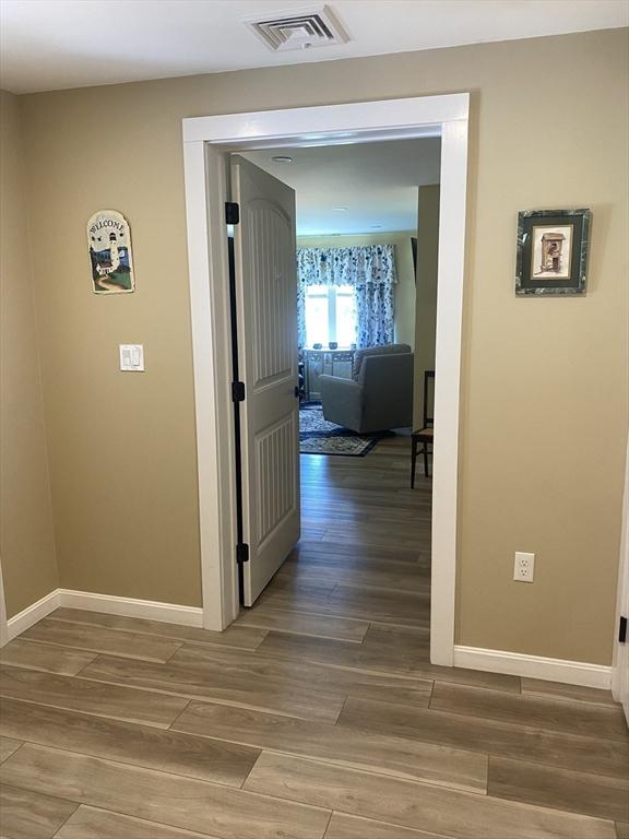9 Pine City Rd, Carver, MA 02330 - hallway featuring baseboards and wood finished floors