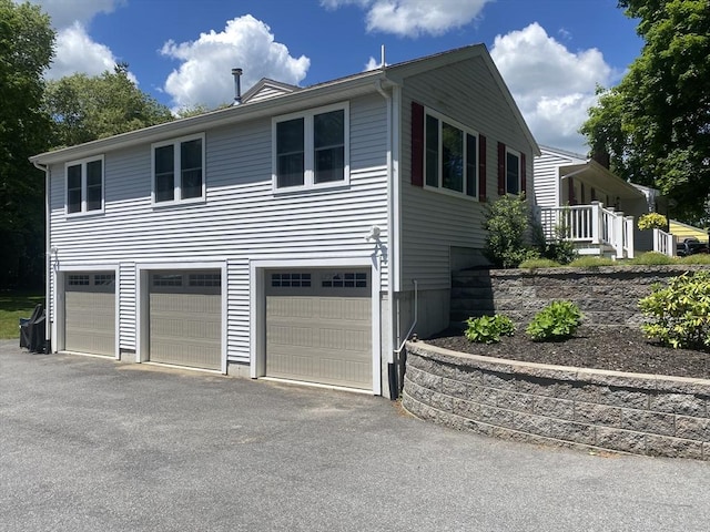 9 Pine City Rd, Carver, MA 02330 - view of property exterior featuring asphalt driveway and a garage