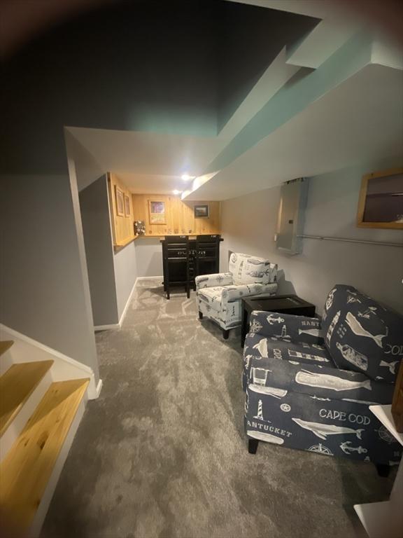 9 Pine City Rd, Carver, MA 02330 - interior space featuring carpet flooring, electric panel, bar area, and baseboards