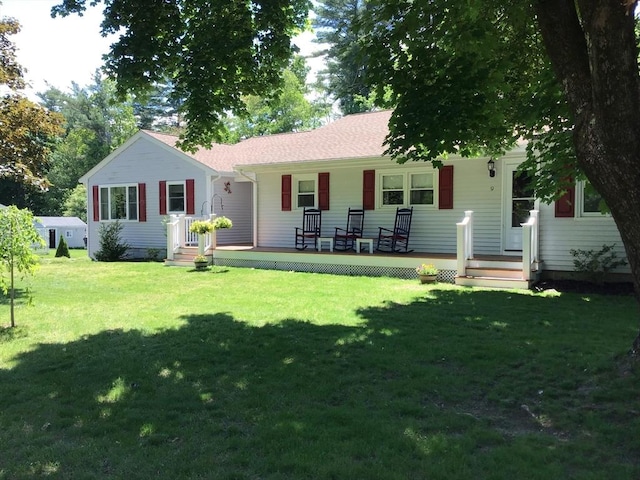 9 Pine City Rd, Carver, MA 02330 - back of property featuring a lawn and covered porch