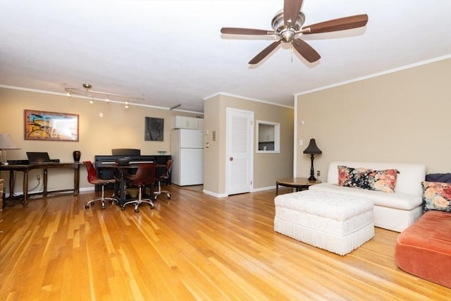 5 Cass St Unit 12, Boston, MA 02132 - living room with an office area, crown molding, wood finished floors, a ceiling fan, and rail lighting