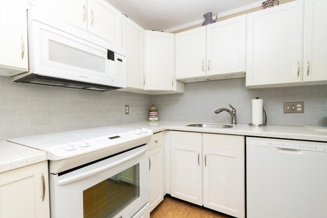 5 Cass St Unit 12, Boston, MA 02132 - kitchen with white appliances, a sink, tasteful backsplash, and white cabinets