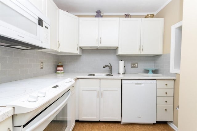 5 Cass St Unit 12, Boston, MA 02132 - kitchen featuring white appliances, a sink, backsplash, white cabinetry, and crown molding