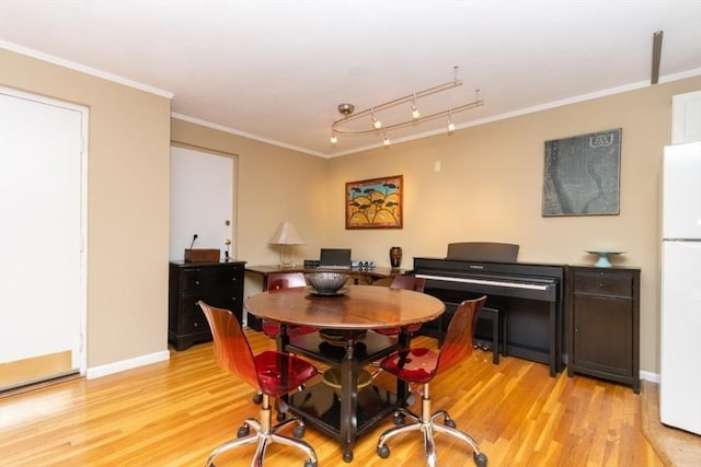 5 Cass St Unit 12, Boston, MA 02132 - dining area featuring light wood-style floors, ornamental molding, and baseboards