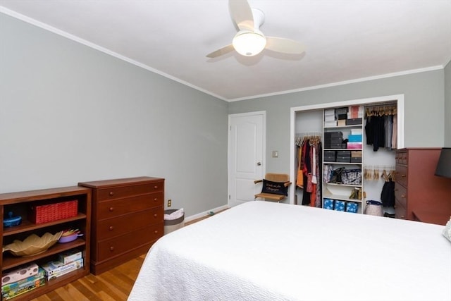 5 Cass St Unit 12, Boston, MA 02132 - bedroom with a closet, wood finished floors, crown molding, and a ceiling fan