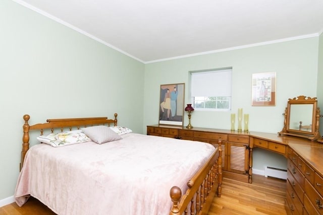 5 Cass St Unit 12, Boston, MA 02132 - bedroom featuring a baseboard radiator, light wood-style floors, ornamental molding, an office area, and baseboards