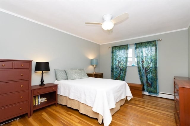 5 Cass St Unit 12, Boston, MA 02132 - bedroom featuring light wood-style flooring, ornamental molding, baseboard heating, and a ceiling fan