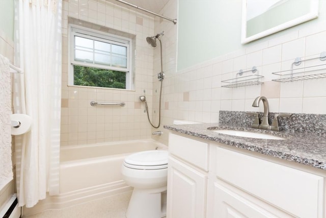 5 Cass St Unit 12, Boston, MA 02132 - full bathroom with vanity, a baseboard heating unit, shower / bath combo, toilet, and tile walls