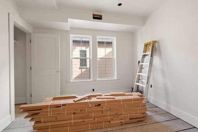 unfurnished bedroom with baseboards