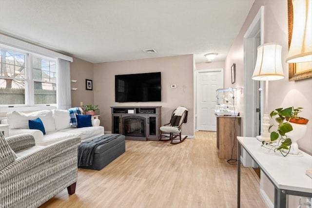 living room with light wood-type flooring