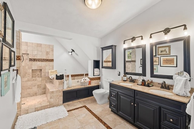 6 Rio, Gloucester, MA 01930 - bathroom with double vanity, tile patterned floors, a walk in shower, lofted ceiling, and a tub to relax in