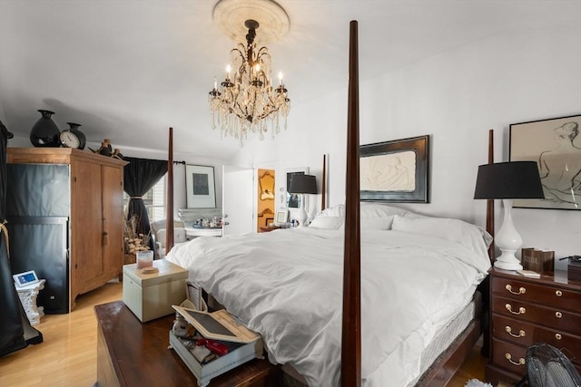 6 Rio, Gloucester, MA 01930 - bedroom with light wood-style flooring and a chandelier