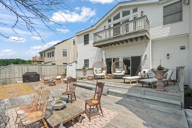 6 Rio, Gloucester, MA 01930 - rear view of property featuring a balcony, a deck, outdoor dining area, and a storage unit
