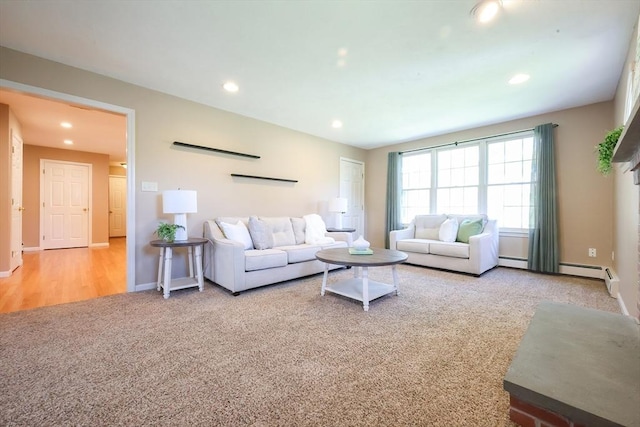 carpeted living room featuring baseboards and recessed lighting
