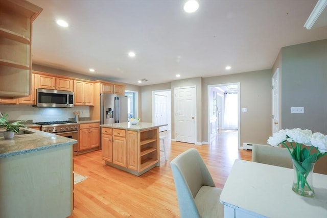 kitchen featuring light wood-style floors, open shelves, appliances with stainless steel finishes, and light brown cabinets