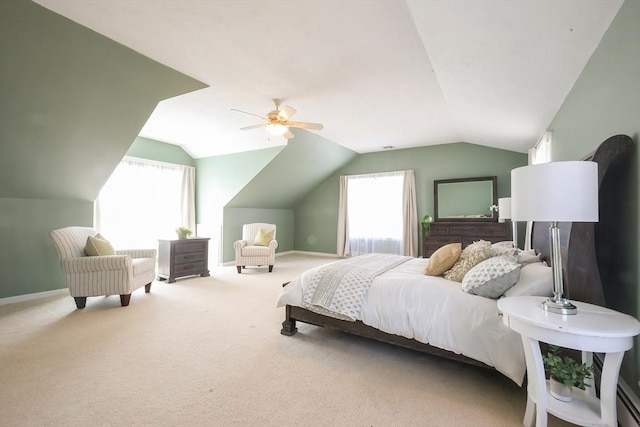 bedroom featuring carpet floors, baseboards, a ceiling fan, and vaulted ceiling