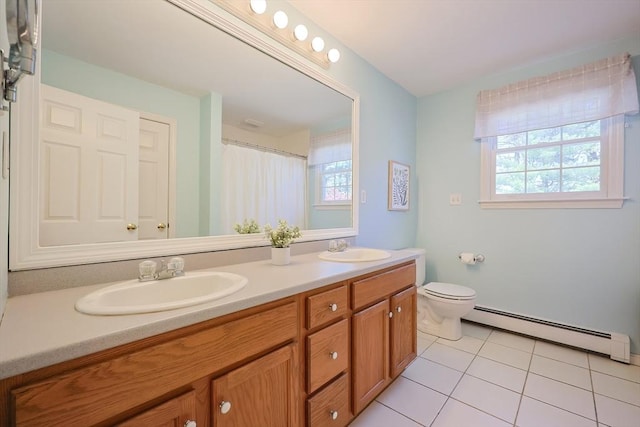 full bathroom featuring a sink, tile patterned floors, a baseboard radiator, and toilet
