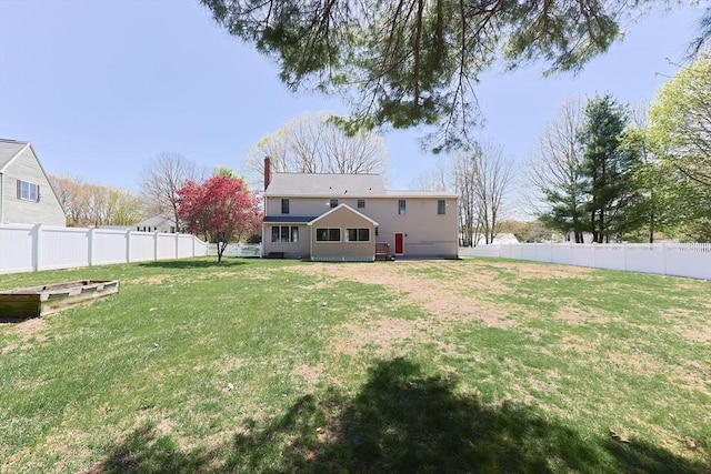 view of yard featuring a fenced backyard