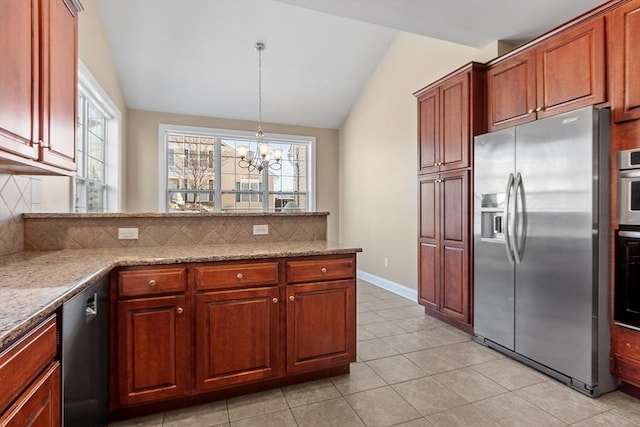 kitchen with stainless steel appliances, light stone countertops, decorative backsplash, and lofted ceiling