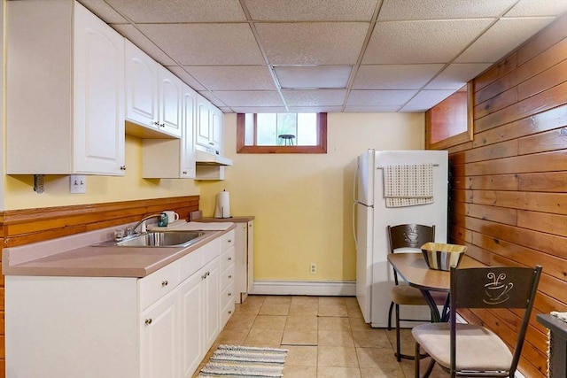 19 Orlando Ave, Winthrop, MA 02152 - kitchen with freestanding refrigerator, a sink, baseboard heating, white cabinets, and a drop ceiling
