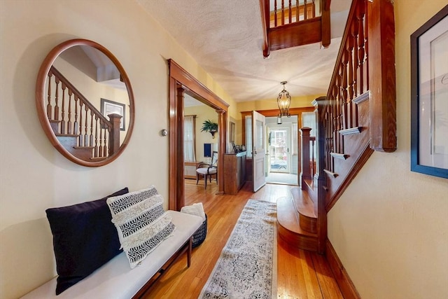 19 Orlando Ave, Winthrop, MA 02152 - foyer entrance featuring stairs, wood finished floors, and baseboards