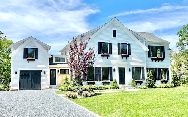 view of front facade with a front yard