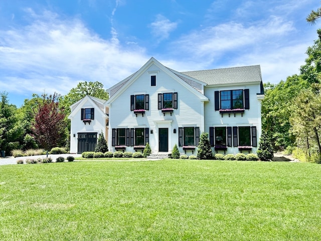 view of front of property with a front lawn