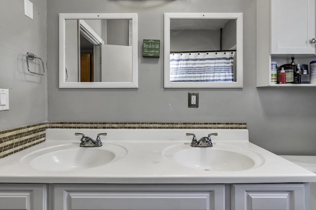 87 Lilley Ave, Lowell, MA 01850 - bathroom featuring double vanity