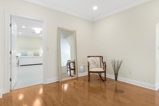 95 Conant St Unit 404, Concord, MA 01742 - living area featuring wood finished floors, baseboards, ornamental molding, and recessed lighting