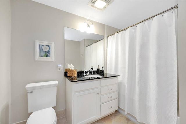 95 Conant St Unit 404, Concord, MA 01742 - full bath featuring vanity, toilet, tile patterned flooring, and a shower with shower curtain