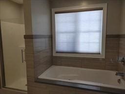 41 Rustic Dr, Worcester, MA 01609 - bathroom featuring a stall shower and a garden tub