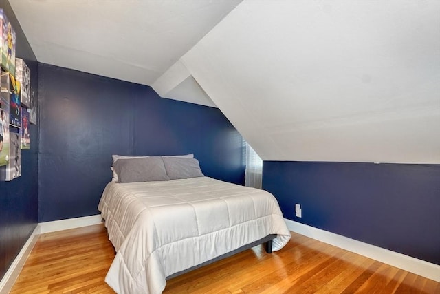 108 Needham St, Dedham, MA 02026 - bedroom featuring wood finished floors, lofted ceiling, and baseboards