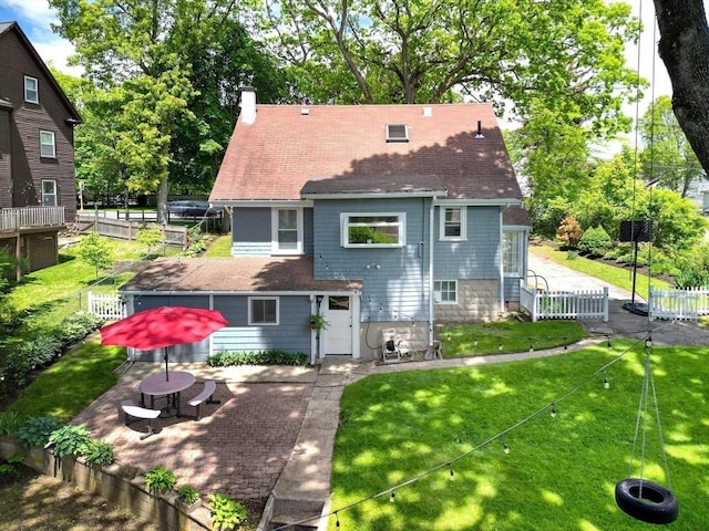 108 Needham St, Dedham, MA 02026 - back of house with a shingled roof, a chimney, and a patio area