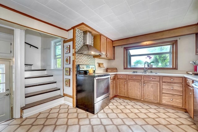 108 Needham St, Dedham, MA 02026 - kitchen featuring electric range, wall chimney range hood, a sink, light countertops, and healthy amount of natural light