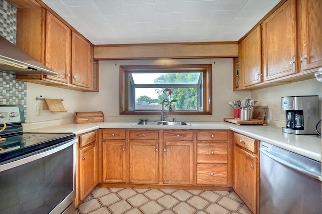 108 Needham St, Dedham, MA 02026 - kitchen with appliances with stainless steel finishes, wall chimney exhaust hood, a sink, light countertops, and brown cabinetry