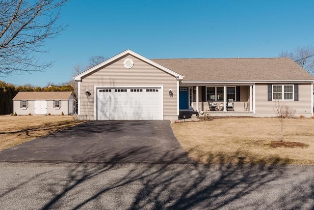 ranch-style house with a porch, roof with shingles, driveway, and a garage