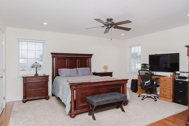 bedroom with baseboards, a ceiling fan, and recessed lighting