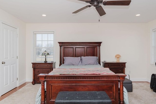 bedroom with a ceiling fan, recessed lighting, and baseboards