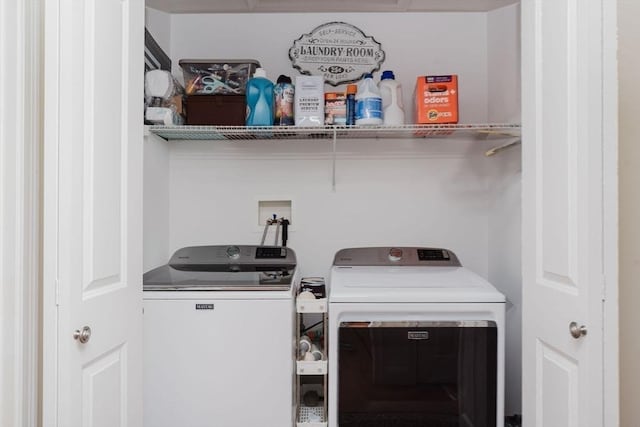 laundry area featuring laundry area and washing machine and dryer