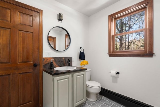 5 Crescent Ln, Sudbury, MA 01776 - half bathroom featuring tile patterned flooring, vanity, and toilet