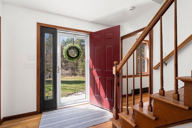 5 Crescent Ln, Sudbury, MA 01776 - foyer featuring stairway, light wood-type flooring, and baseboards