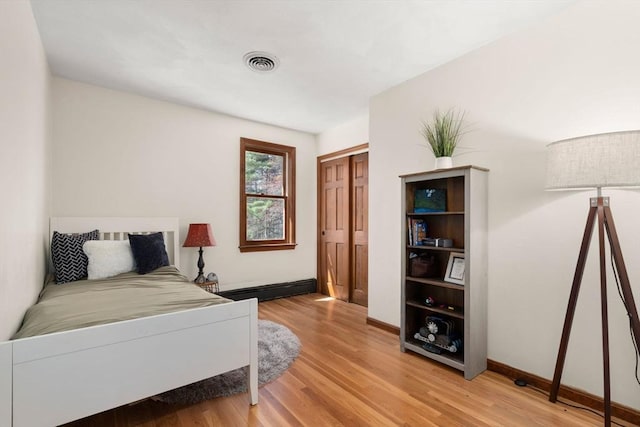 5 Crescent Ln, Sudbury, MA 01776 - bedroom featuring visible vents, baseboards, and light wood finished floors