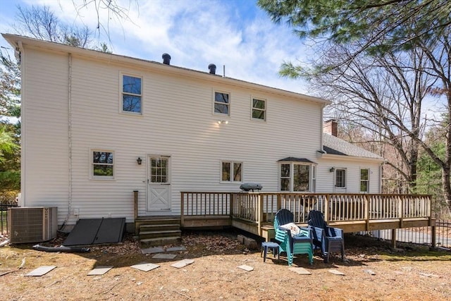 5 Crescent Ln, Sudbury, MA 01776 - back of house with a chimney, a wooden deck, and central AC unit