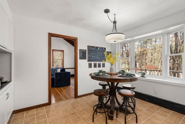 5 Crescent Ln, Sudbury, MA 01776 - dining space with light tile patterned floors and baseboards