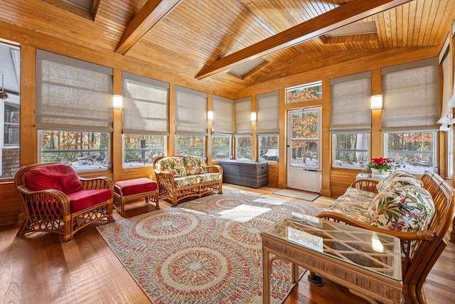 sunroom with vaulted ceiling with beams and wooden ceiling