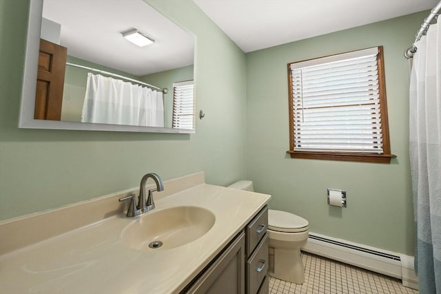 bathroom with tile patterned flooring, a baseboard radiator, vanity, and toilet