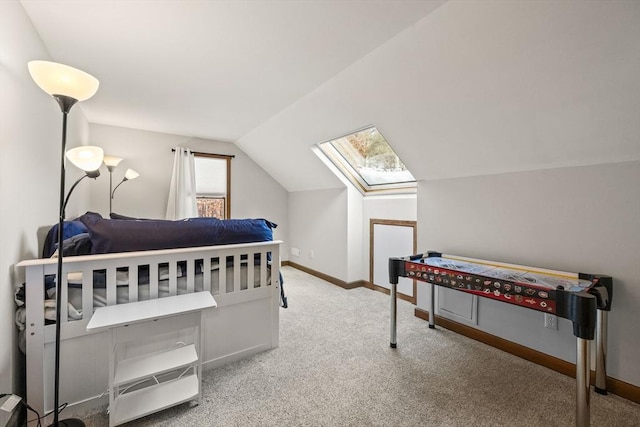 bedroom with lofted ceiling and carpet